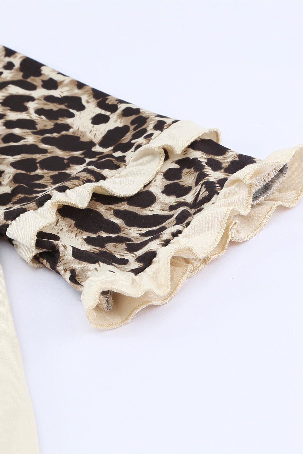Cheetah Print Tiered Half Sleeve Jewel Neckline Blouse