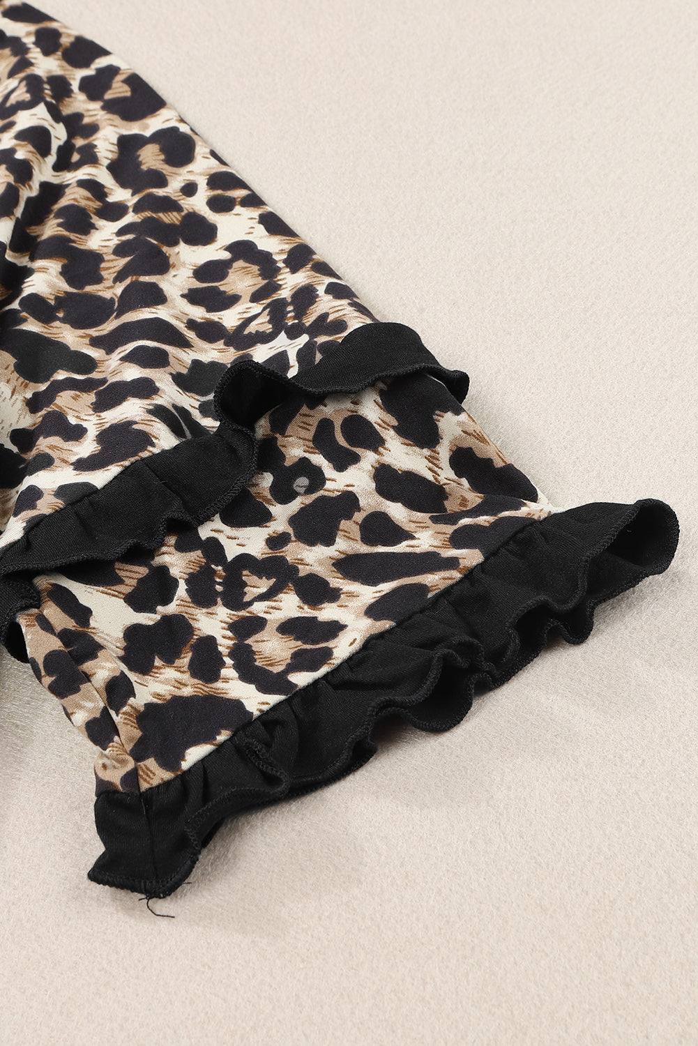 Cheetah Print Tiered Half Sleeve Jewel Neckline Blouse